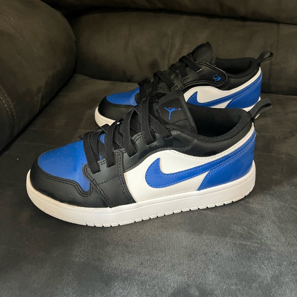 Kids Jordan 1 Low Blue and Black Sneakers